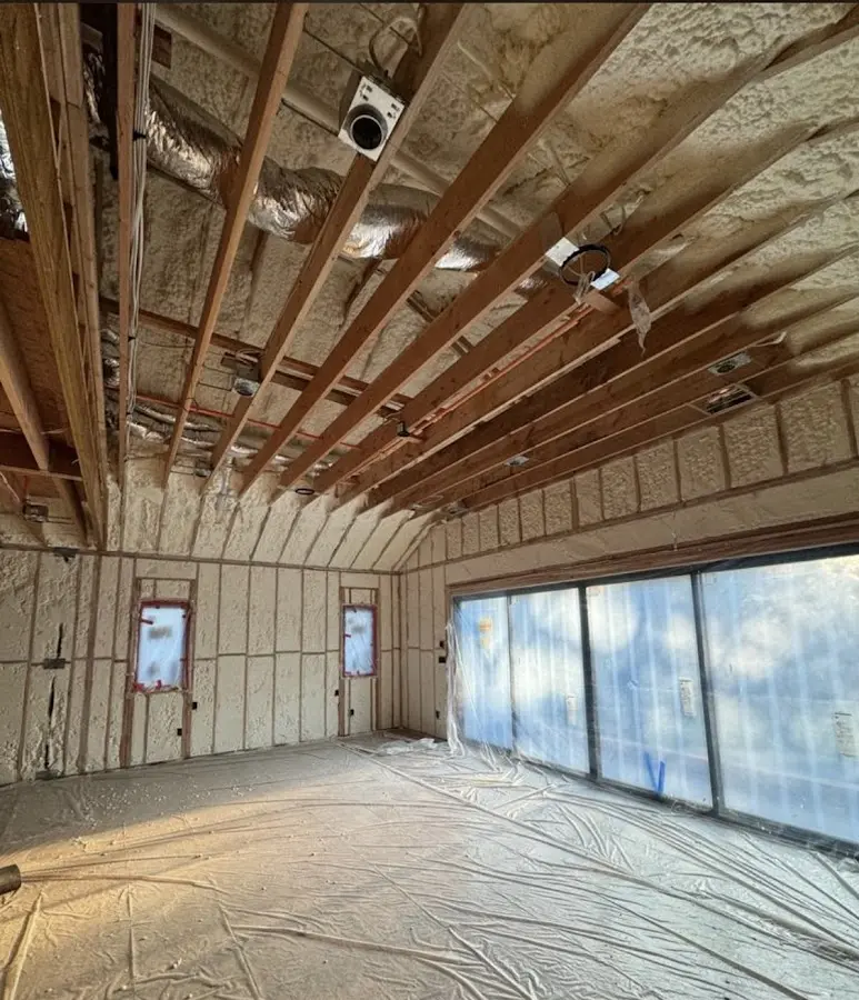 Interior walls and ceiling insulated with spray foam during new construction in Norfolk
